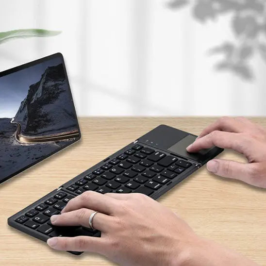 clavier bluetooth noir mains